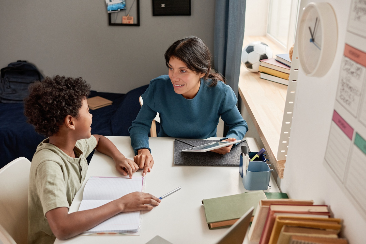 Autism Tutor and student working together